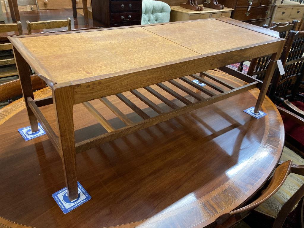 A Rempley teak sliding top coffee table, circa 1970